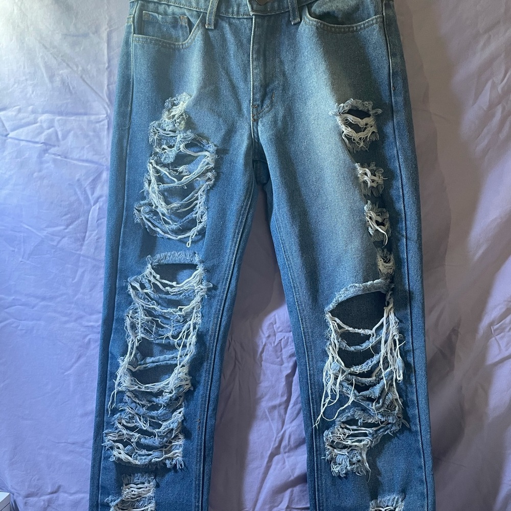 Very high end ripped jeans 👖